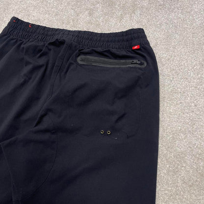 Black Nike tracksuit bottoms Medium y2k style sportswear track pants slim cuffed