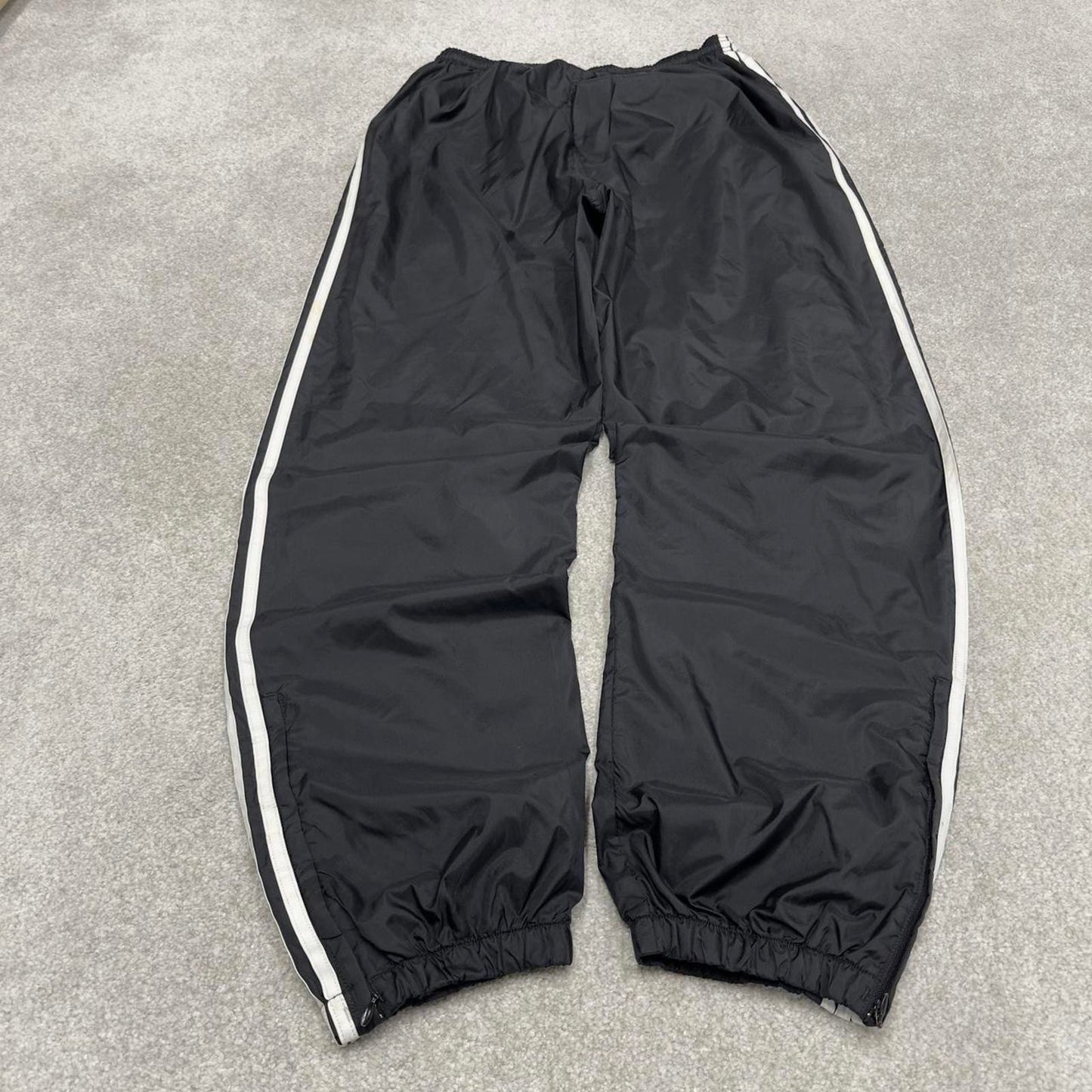 Black Adidas tracksuit bottoms Large y2k style sportswear track pants side stripe design