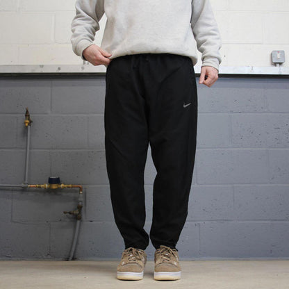 Nike Dri Fit Trackies XL black y2k 00s style loose leg joggers print logo