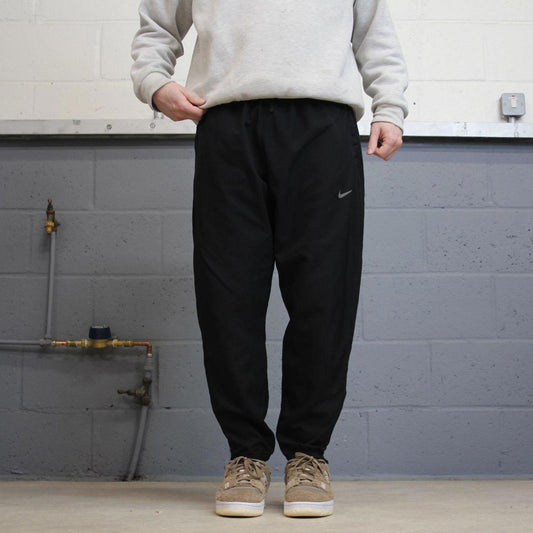 Nike Dri Fit Trackies XL black y2k 00s style loose leg joggers print logo