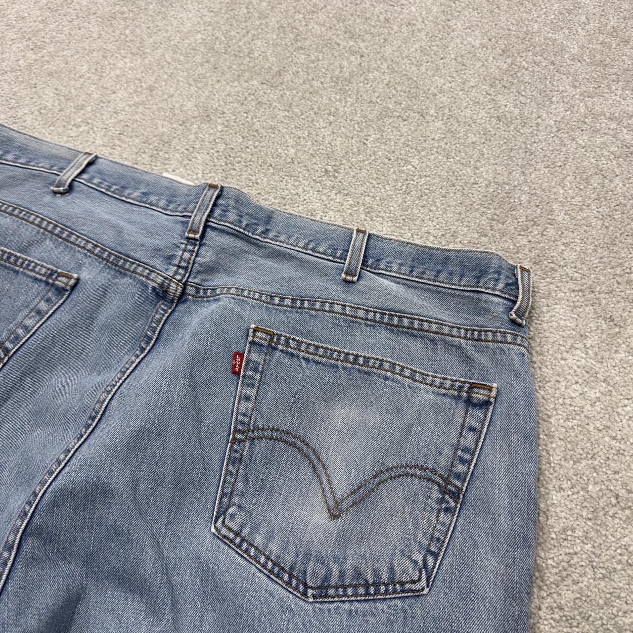 Baggy Levi’s 560 jeans y2k W40L30 blue Loose leg comfort fit denim 2000s style red tab logo jeans