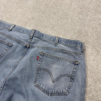 Baggy Levi’s 560 jeans y2k W40L30 blue Loose leg comfort fit denim 2000s style red tab logo jeans