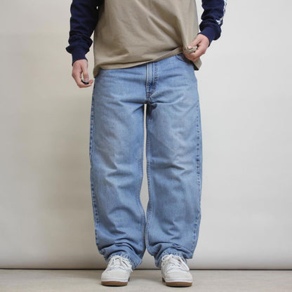 Levis jeans W38 L32 loose blue denim 90s style jeans red tab logo