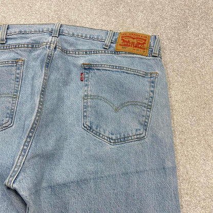Vintage Y2K Levi’s 505 jeans light wash blue Straight leg 00s style denim pants red tab logo