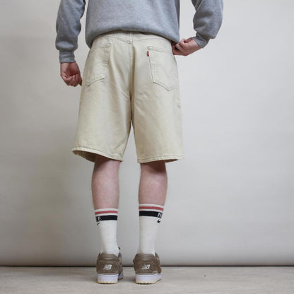 Beige Levi's 550 jorts W36