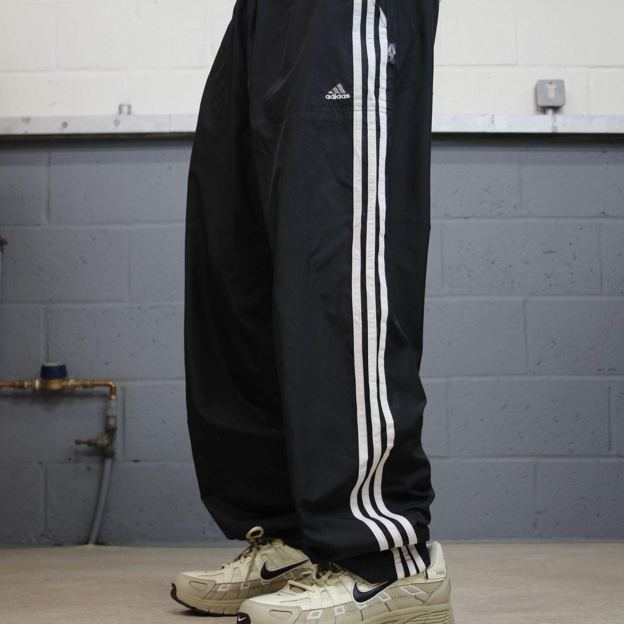 Vintage Adidas tracksuit bottoms loose black Loose floaty embroidered side stripe track pants