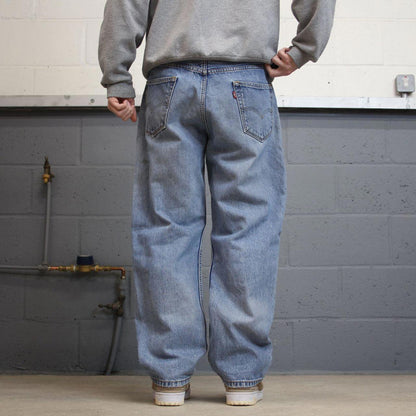 Y2K baggy Levi’s 550 jeans wide leg blue Loose fit denim pants red tab logo