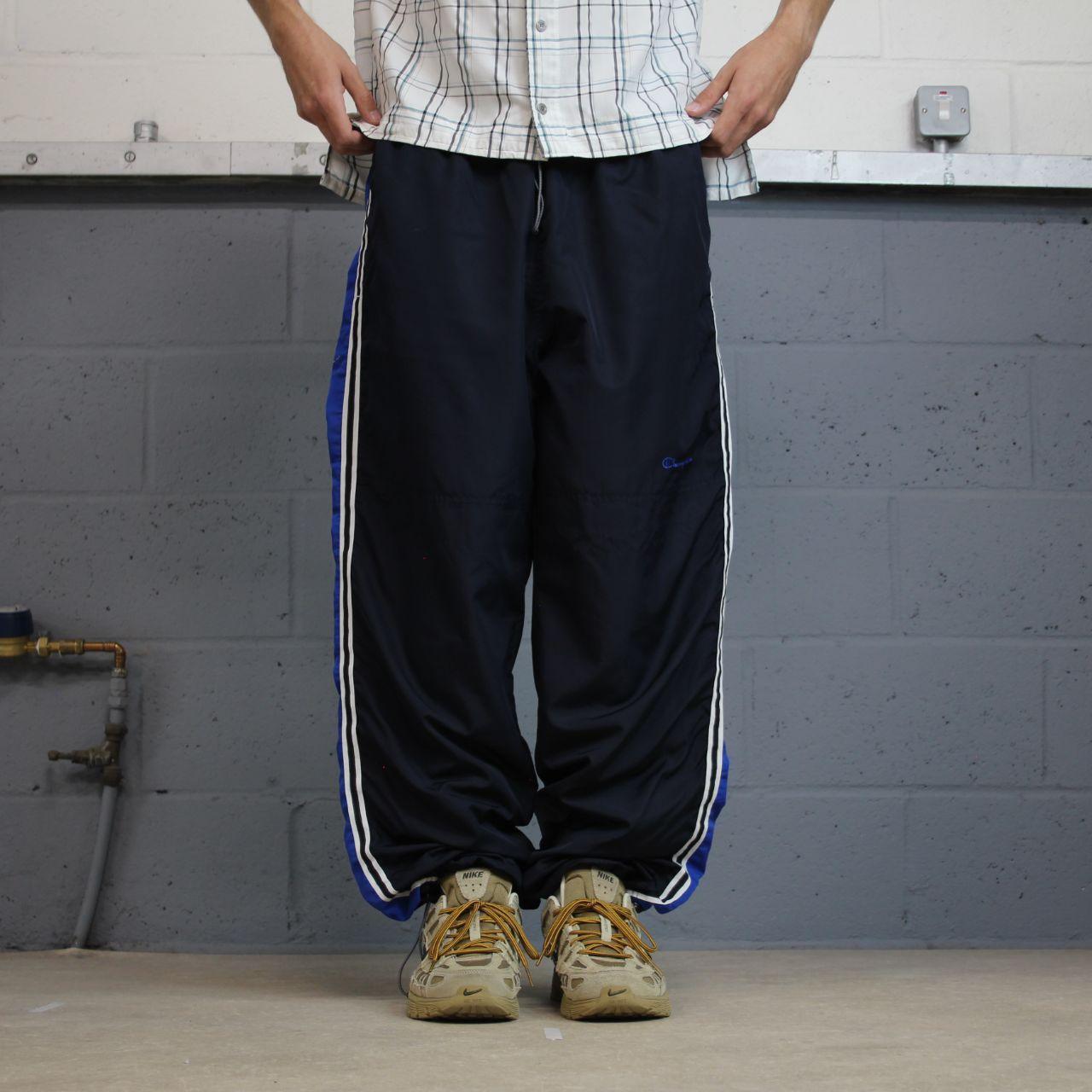 Baggy Y2K Champion tracksuit bottoms navy Loose leg lined 2000s style casual track pants