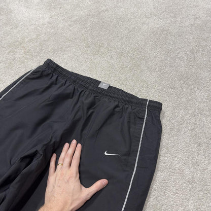 Vintage Nike baggy tracksuit bottoms black wide leg L swoosh logo track pants