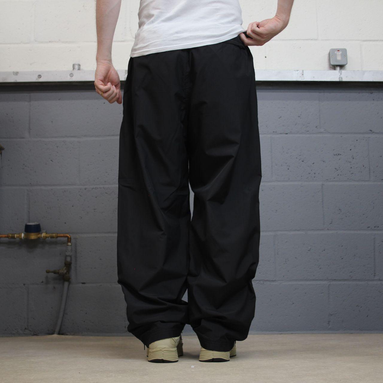 Champion baggy tracksuit bottoms wide leg black Mesh lined embroidered logo gym wear track pants