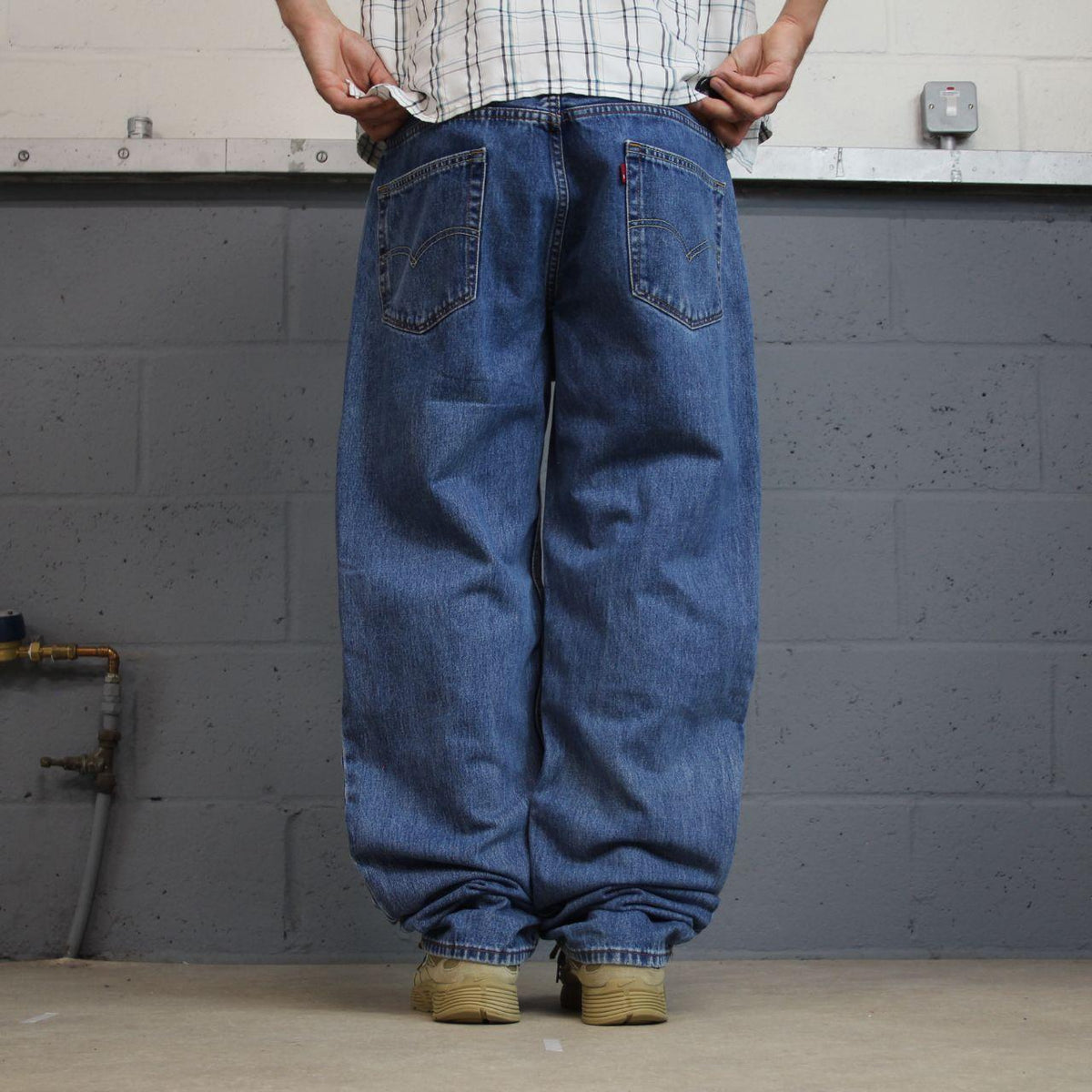 Levi’s 550 jeans Y2K blue denim loose leg 2000s style pants red tab logo