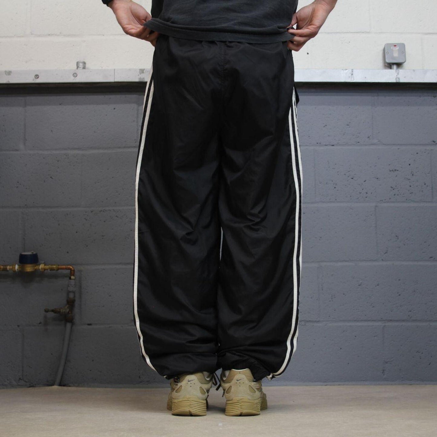 Vintage Adidas tracksuit bottoms loose black Loose floaty embroidered side stripe track pants