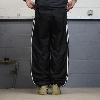 Vintage Adidas tracksuit bottoms loose black Loose floaty embroidered side stripe track pants