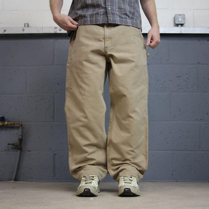 Tan baggy vintage Carhartt carpenter pants y2k Loose leg 2000s skater style workwear