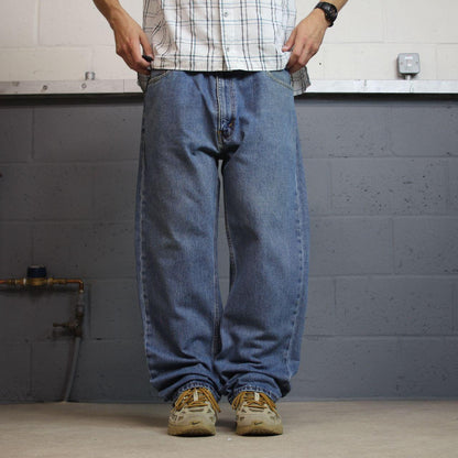 Y2K Levi’s 505 jeans W42L32 blue 100% cotton straight fit 5 pocket belt loops red tab logo