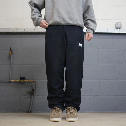 Vintage y2k loose Nike tracksuit bottoms navy black Lightweight mesh lined print logo track pants