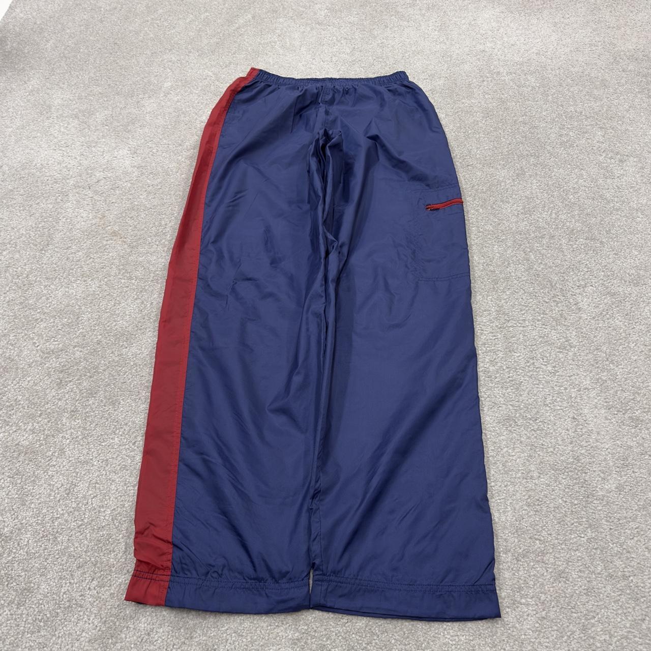 Y2K vintage Nike baggy tracksuit bottoms navy Loose leg 2000s style casual swoosh logo track pants