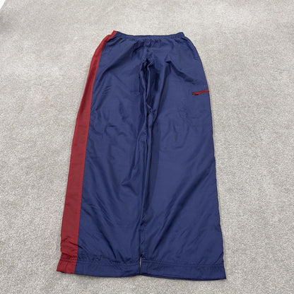 Y2K vintage Nike baggy tracksuit bottoms navy Loose leg 2000s style casual swoosh logo track pants