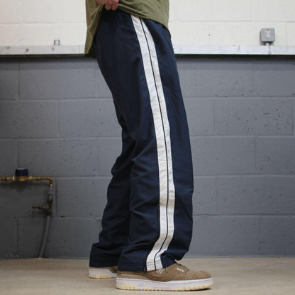 Baggy Reebok tracksuit bottoms vintage wide leg navy Loose embroidered side stripe track pants