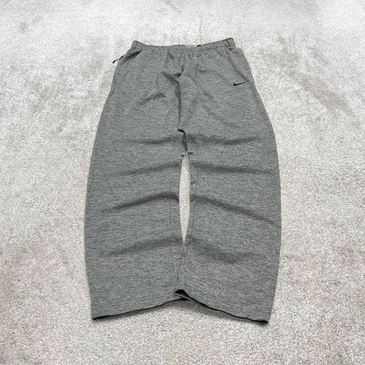 Y2K Nike loose sweatpants joggers grey Swoosh logo fleece lined gym drawstring track pants