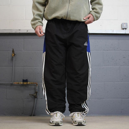 Vintage Y2K baggy Adidas tracksuit bottoms black Embroidered logo lined stripe track pants