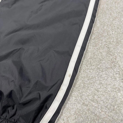 Black Adidas tracksuit bottoms Large y2k style sportswear track pants side stripe design