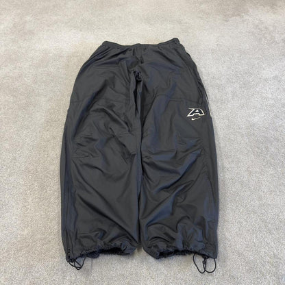 Nike baggy tracksuit bottoms wide leg charcoal Storm-Fit lined embroidered cuffable track pants
