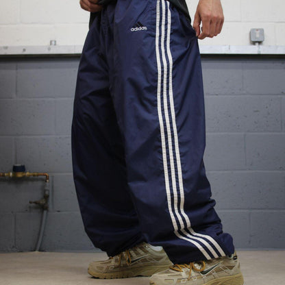 Vintage Y2K baggy Adidas tracksuit bottoms navy Loose-leg embroidered lined side stripe track pants