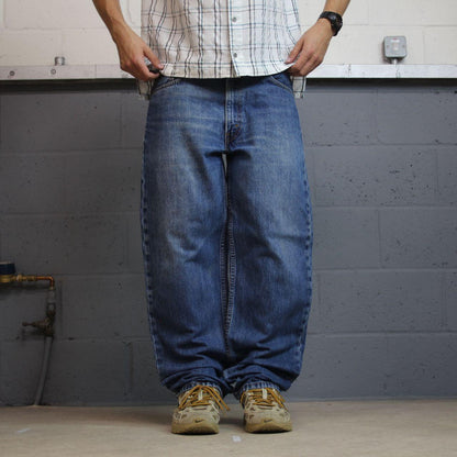 Levi’s 550 jeans y2k blue denim Levi’s loose straight leg 550 pants red tab logo