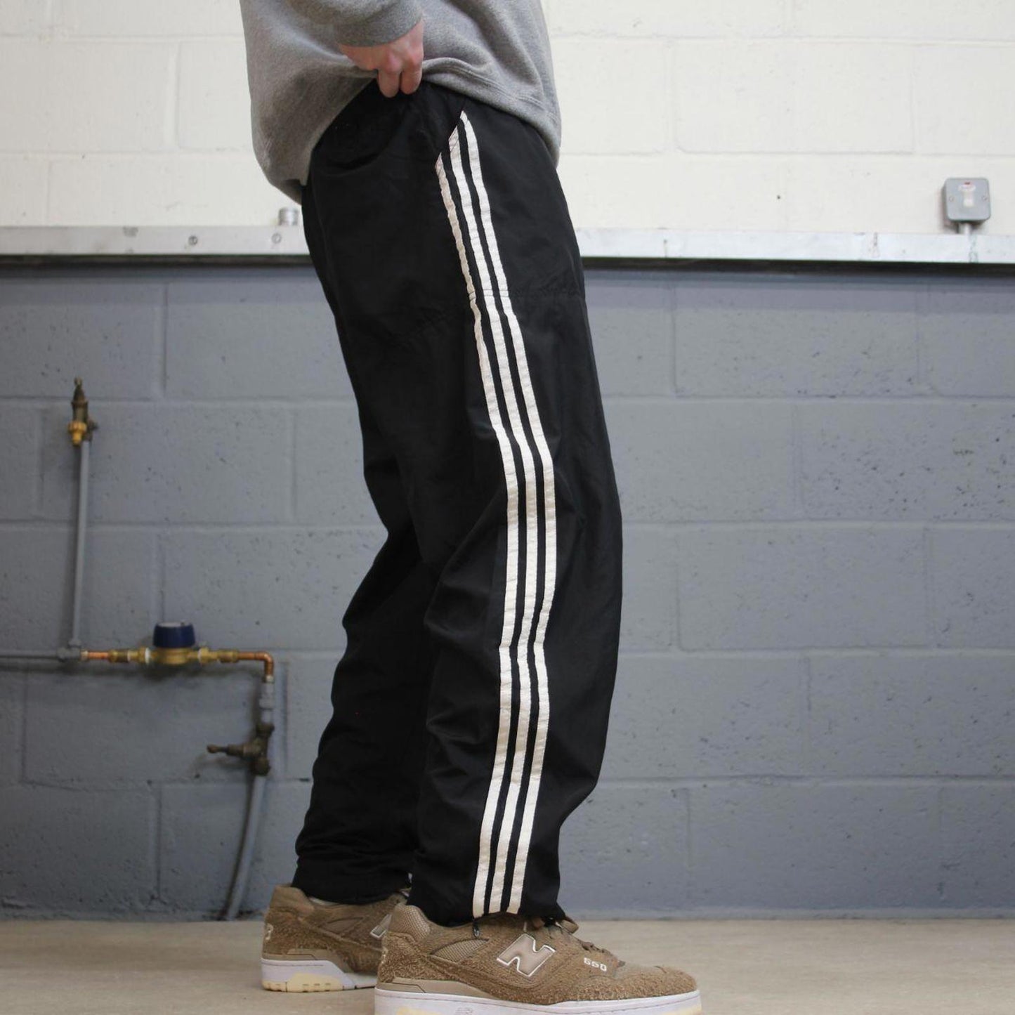 Vintage Y2K Adidas tracksuit bottoms black Loose leg mesh lined side stripe track pants