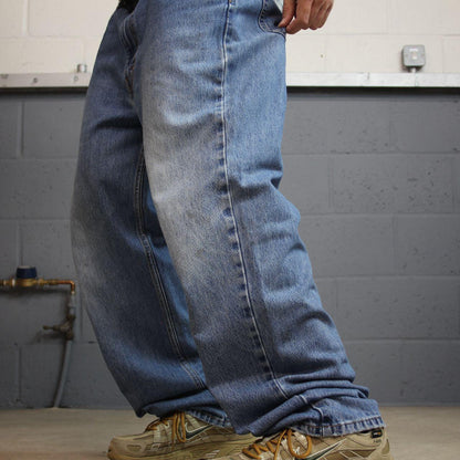 Levi’s 550 jeans Y2K W38L32 blue denim loose leg red tab logo