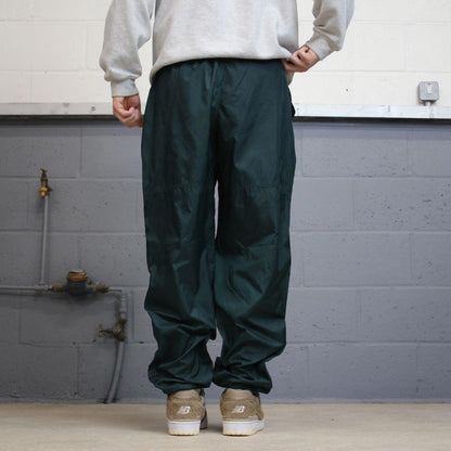 Green vintage Nike trackies Large loose y2k floaty leg joggers embroidered Swoosh logo shell suit