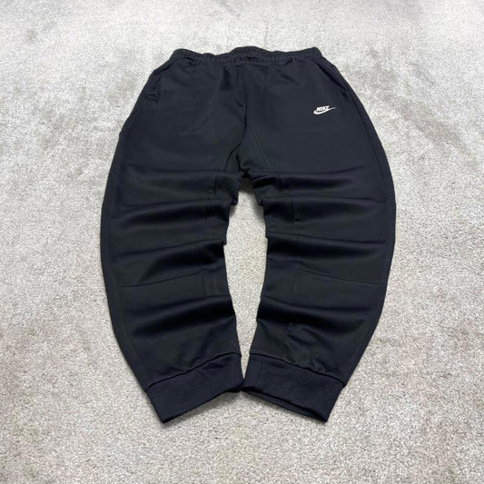 Black Nike tracksuit bottoms Medium y2k style sportswear track pants cuffed embroidered