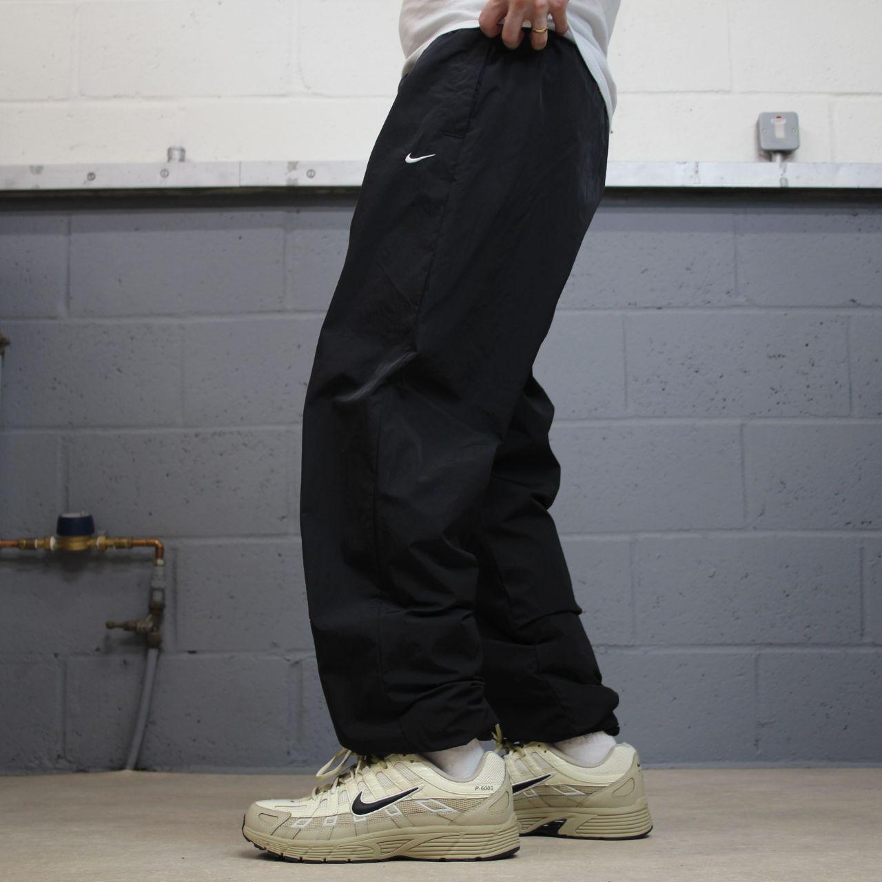 Nike Y2K tracksuit bottoms black Loose floaty mesh lined swoosh logo track pants