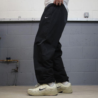 Nike Y2K tracksuit bottoms black Loose floaty mesh lined swoosh logo track pants