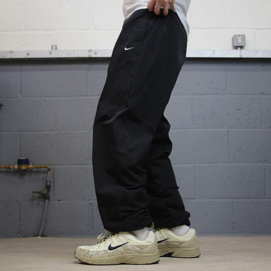 Nike Y2K tracksuit bottoms black Loose floaty mesh lined swoosh logo track pants