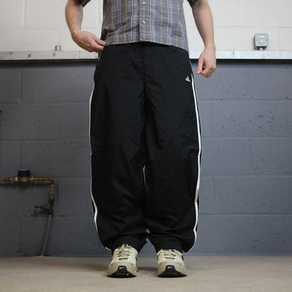 Y2K Adidas tracksuit bottoms black Medium Embroidered side stripe lined track pants