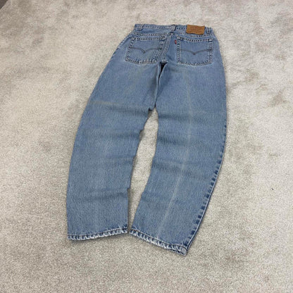 Blue Levis 550 jeans size size 10 W29L32 women's y2k 90s style tapered leg relaxed fit