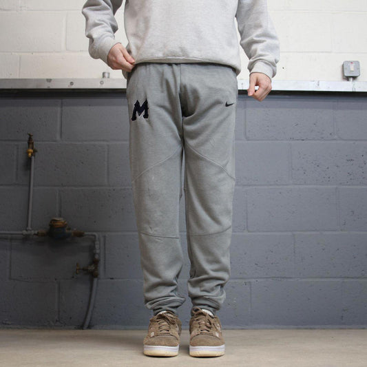 Grey Nike Trackies S y2k sportswear track pants print logo embroidered design