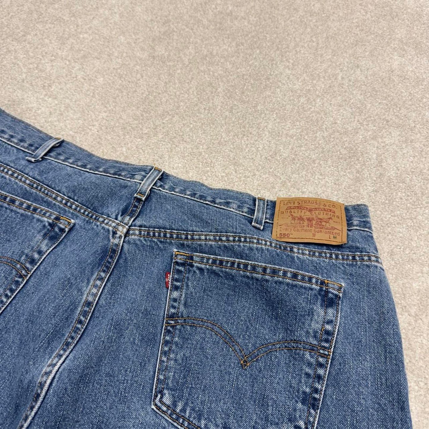 Y2K Levi’s 550 jeans tapered leg blue Loose relaxed fit denim pants red tab logo