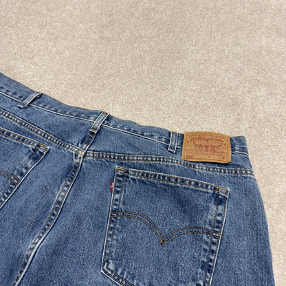 Y2K Levi’s 550 jeans tapered leg blue Loose relaxed fit denim pants red tab logo