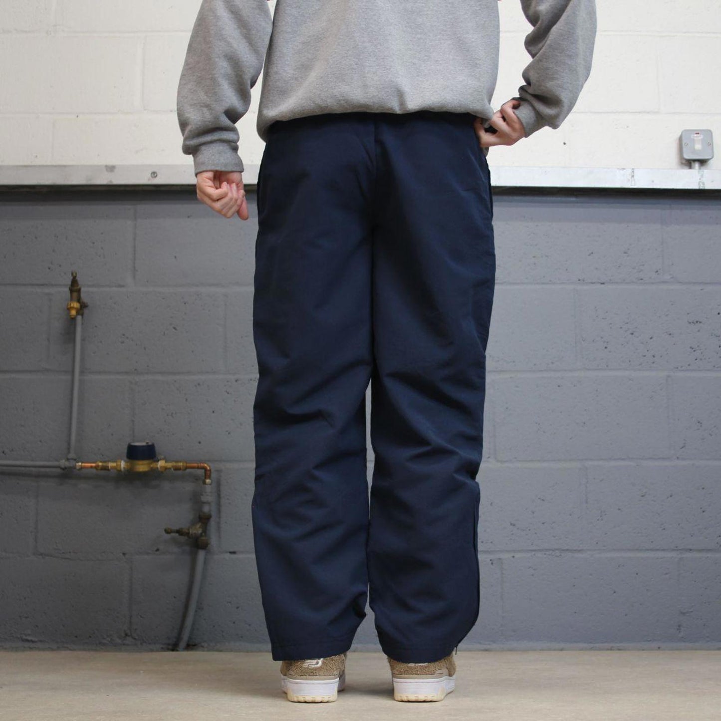 Vintage y2k Reebok tracksuit bottoms navy Loose lined embroidered track pants ankle zips