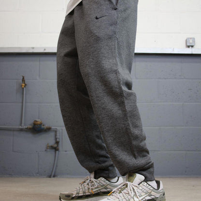 Nike Therma Fit Trackies Large Grey y2k 00s style loose leg joggers embroidered logo