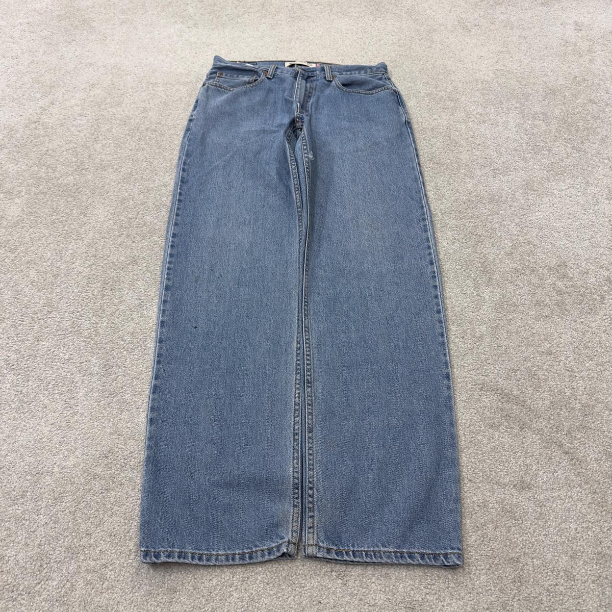 Levi’s 550 jeans Y2K blue relaxed denim Levi’s loose leg 2000s style pants red tab logo