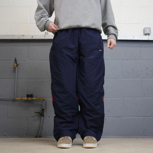 Vintage y2k baggy Nike tracksuit bottoms navy Loose wide-leg lined embroidered stripe track pants