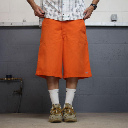 Orange baggy Dickies carpenter chino shorts Chino style skater shorts long wide leg festival