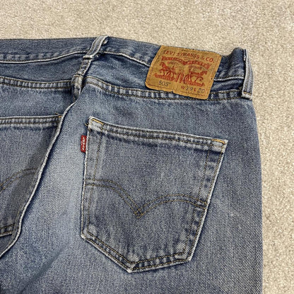 Y2K Levi’s 505 jeans straight leg washed blue Straight fit 5 pocket pants belt loops red tab logo