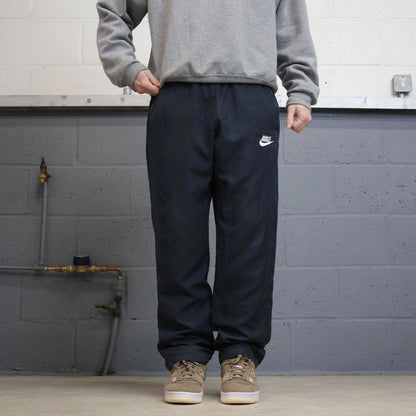 Y2k loose Nike tracksuit bottoms navy Loose lined embroidered track pants