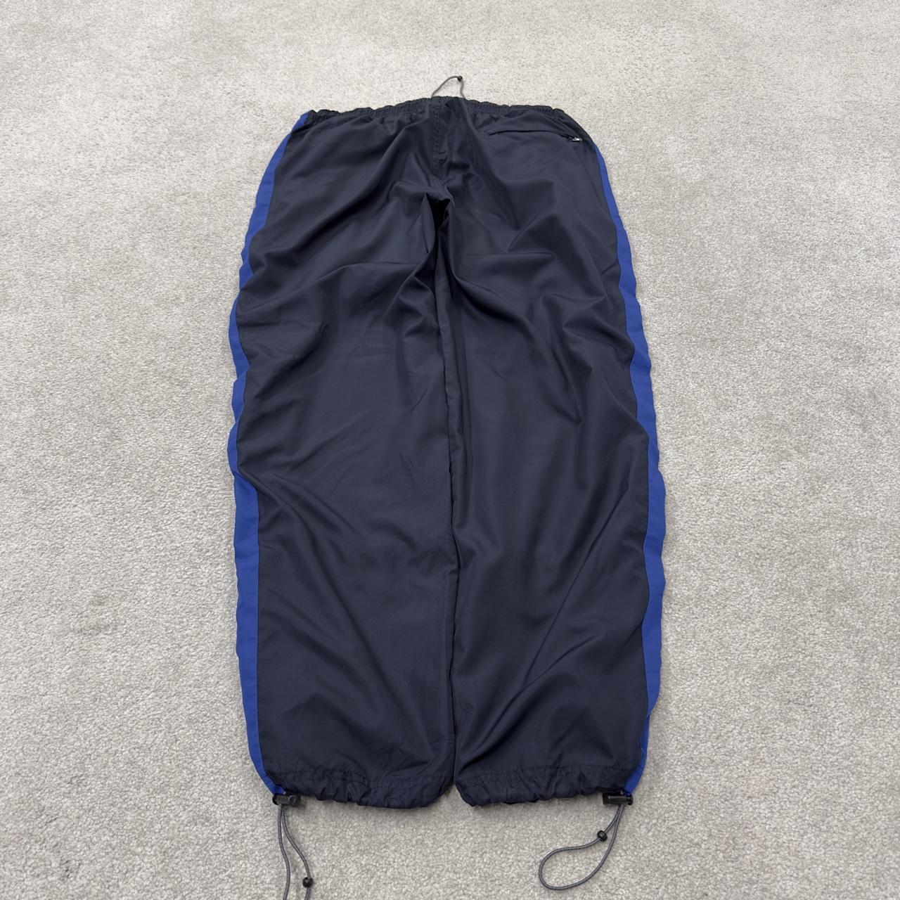 Baggy Y2K Champion tracksuit bottoms navy Loose leg lined 2000s style casual track pants
