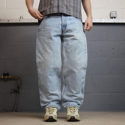 Levi’s 550 jeans y2k W34L30 blue loose straight leg skate style pants red tab logo